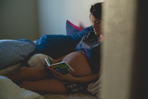 Laying in bed reading