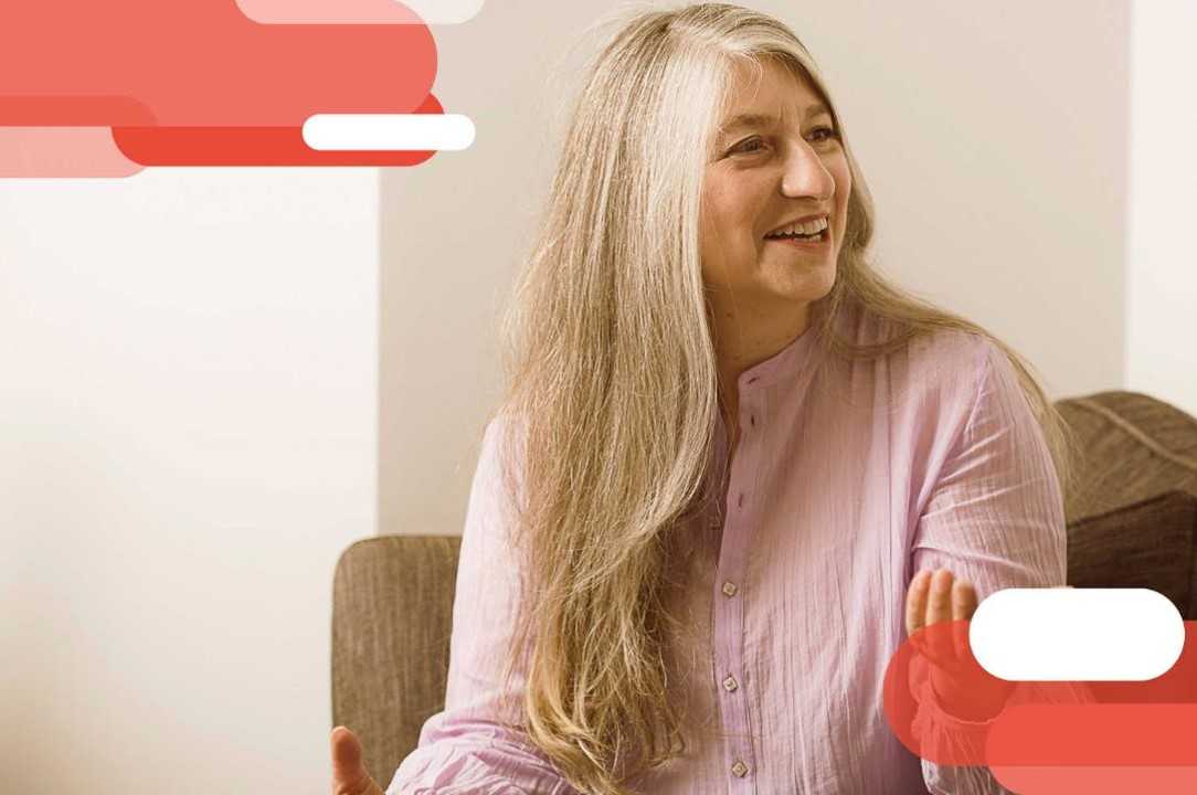 Woman with MS smiling and talking